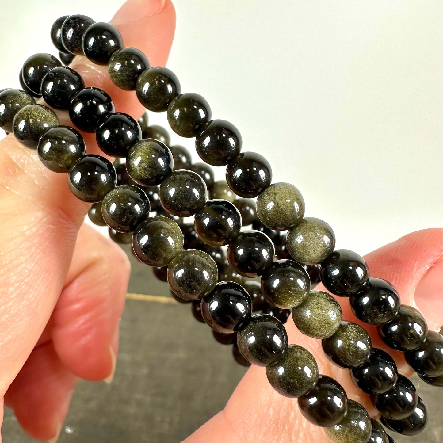 Gylden Obsidian armbånd