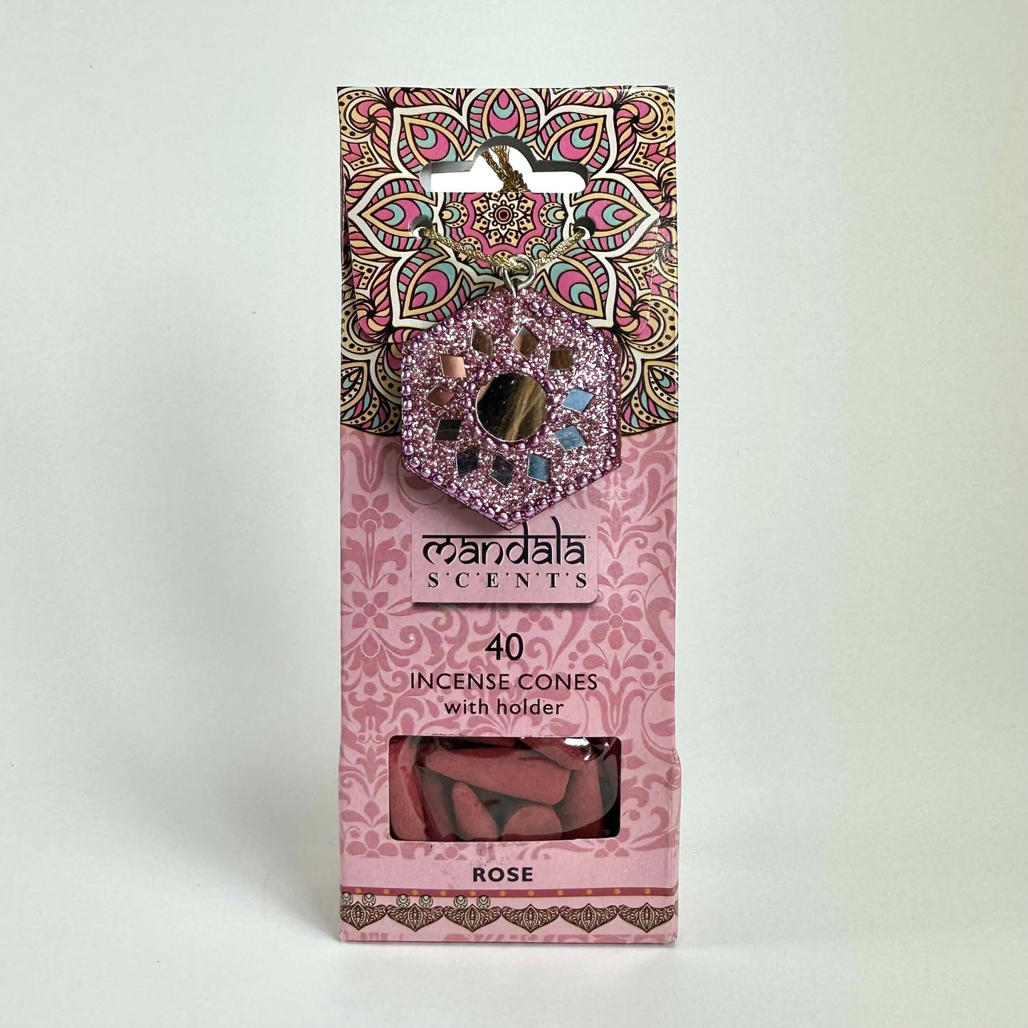 Incensekasser i rosa med mandalamønster og 40 røgelseskegler. Der er en røgelsesholder på pakken.