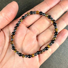 Beskyttelses armbånd