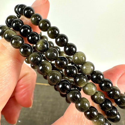 Gylden Obsidian armbånd